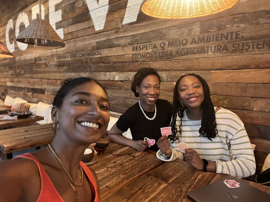Members taking a selfie at a café meetup
